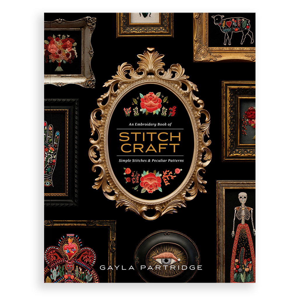 Book cover of 'An Embroidery Book of Stitch & Craft' by Gayla Partridge with decorative frames and floral designs on a black background.
