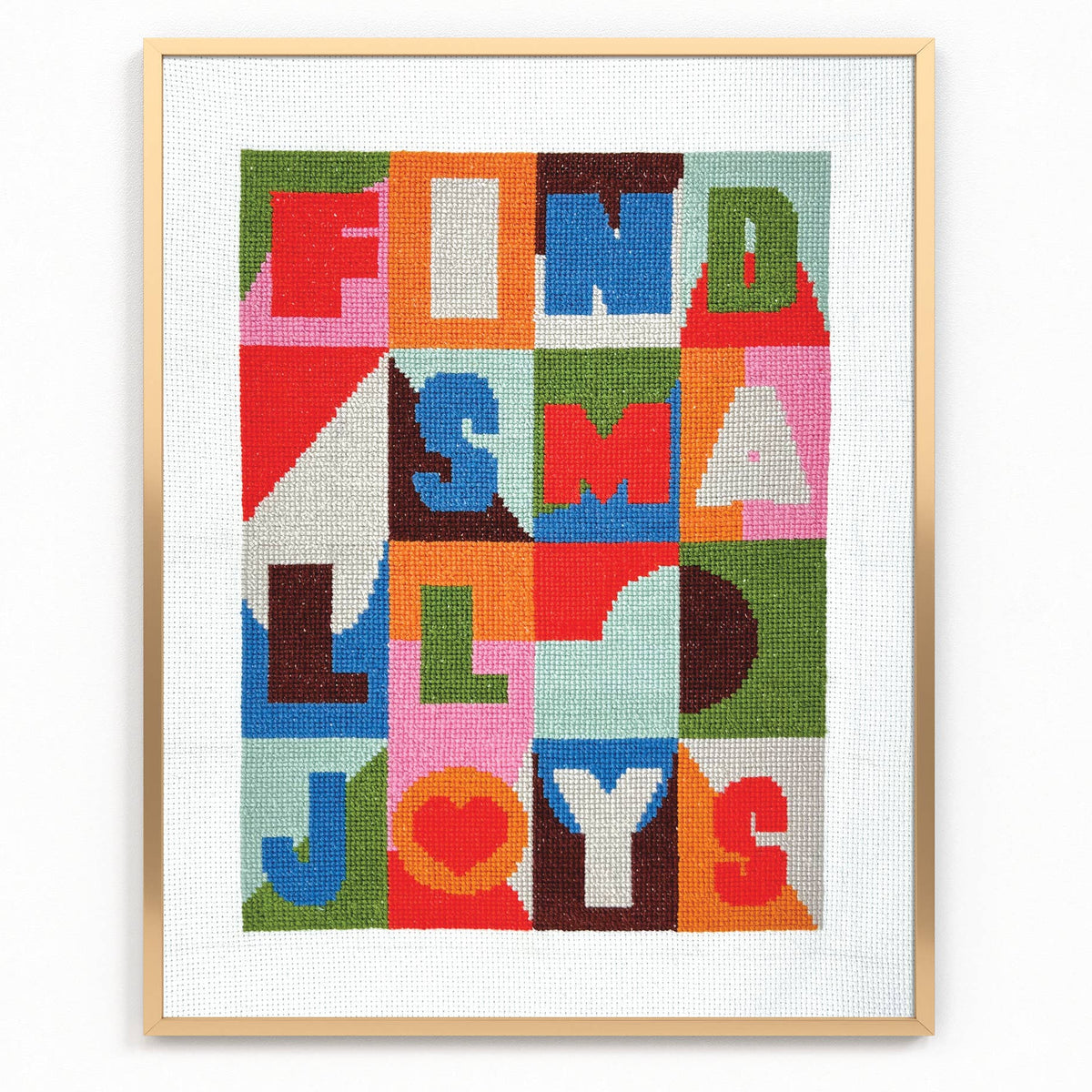 Framed colorful text art with motivational quote on a white background