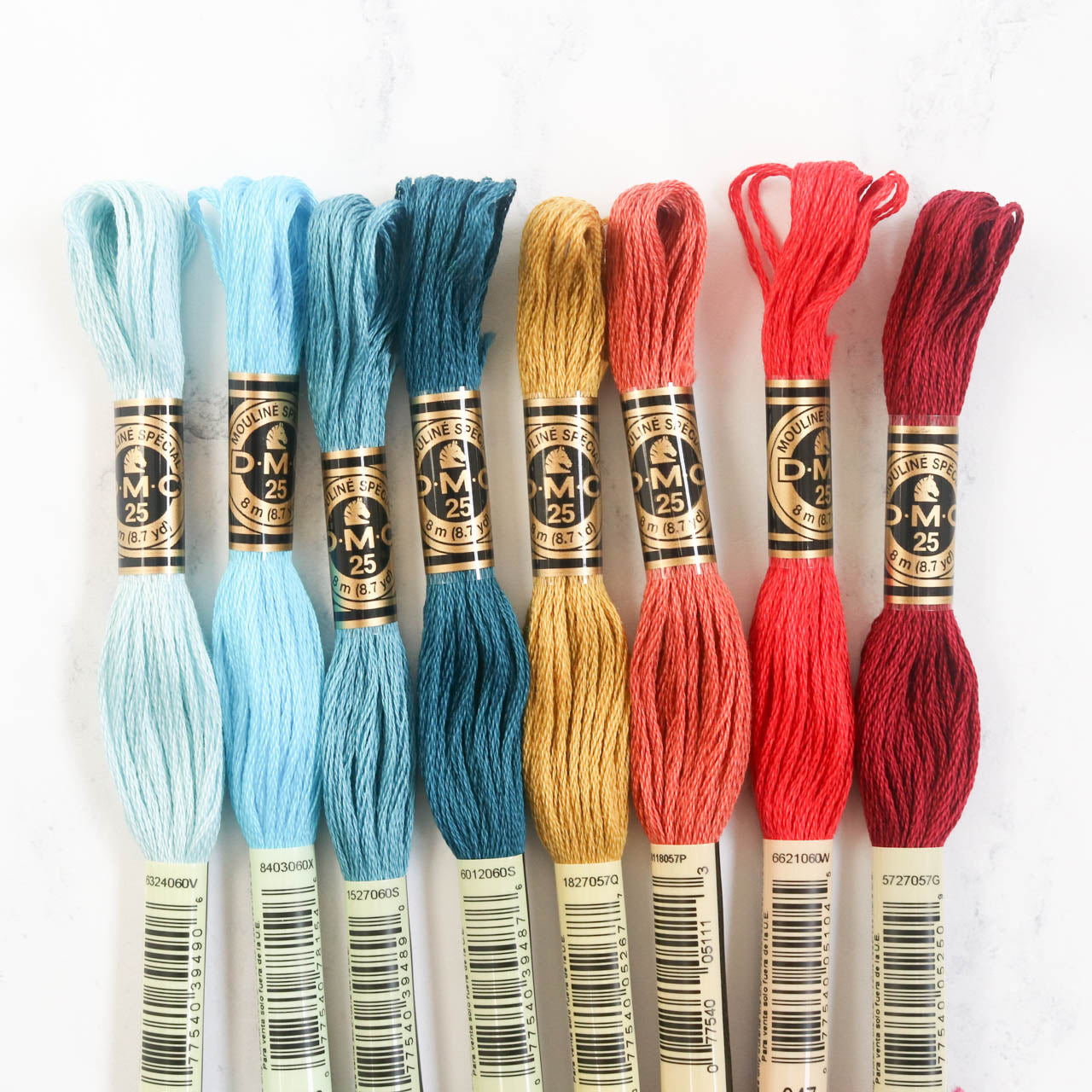 https://stitchedmodern.com/cdn/shop/products/dmc-embroidery-floss-color-palette-pack-vintage-tins-3_2048x.jpg?v=1613706243